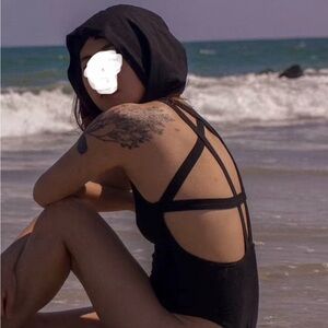 Black hooded star bodysuit